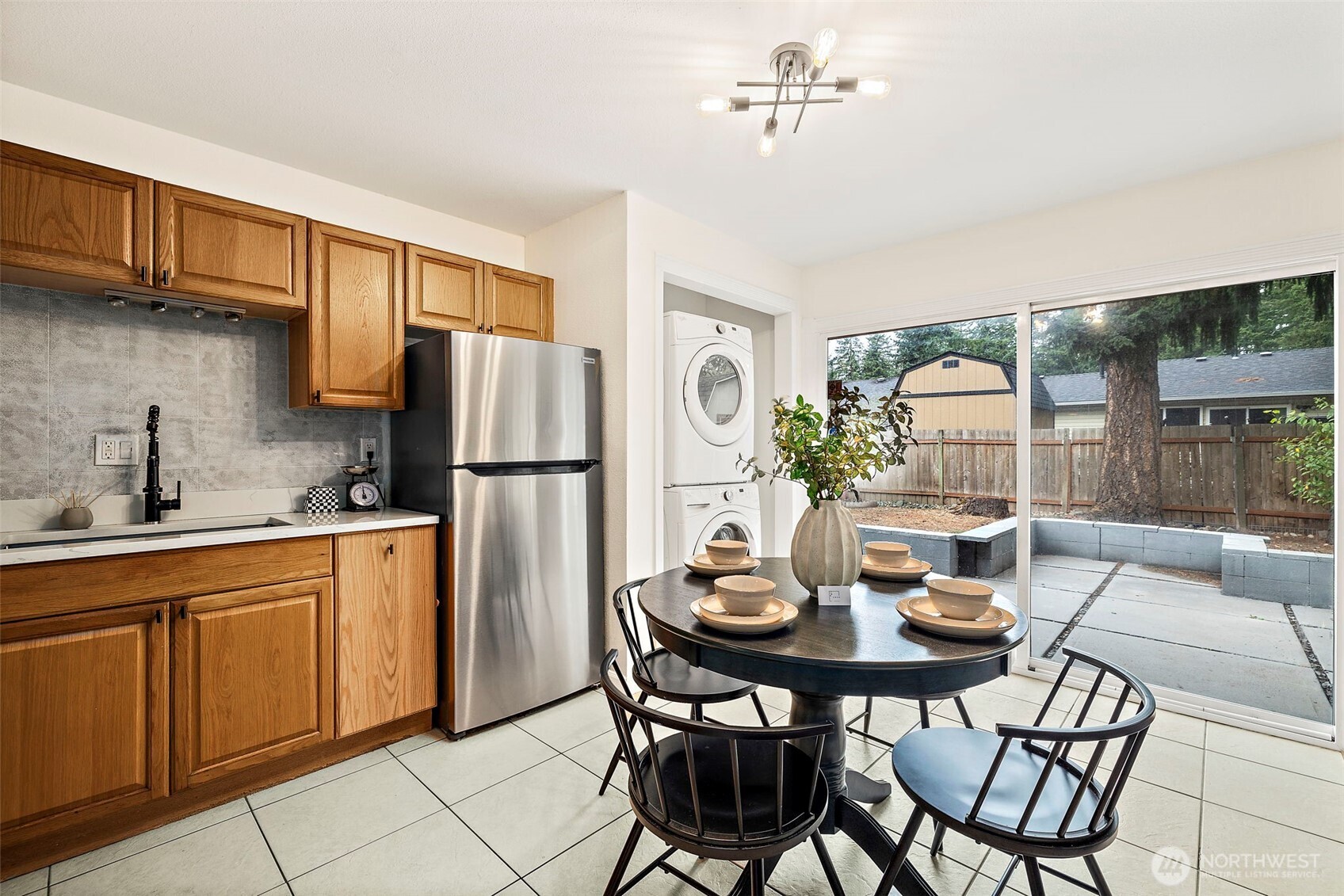 19250 Southeast 268th Street Covington, WA 98042 - Photo 11 of 37 a view of a dining room with furniture window and outside view