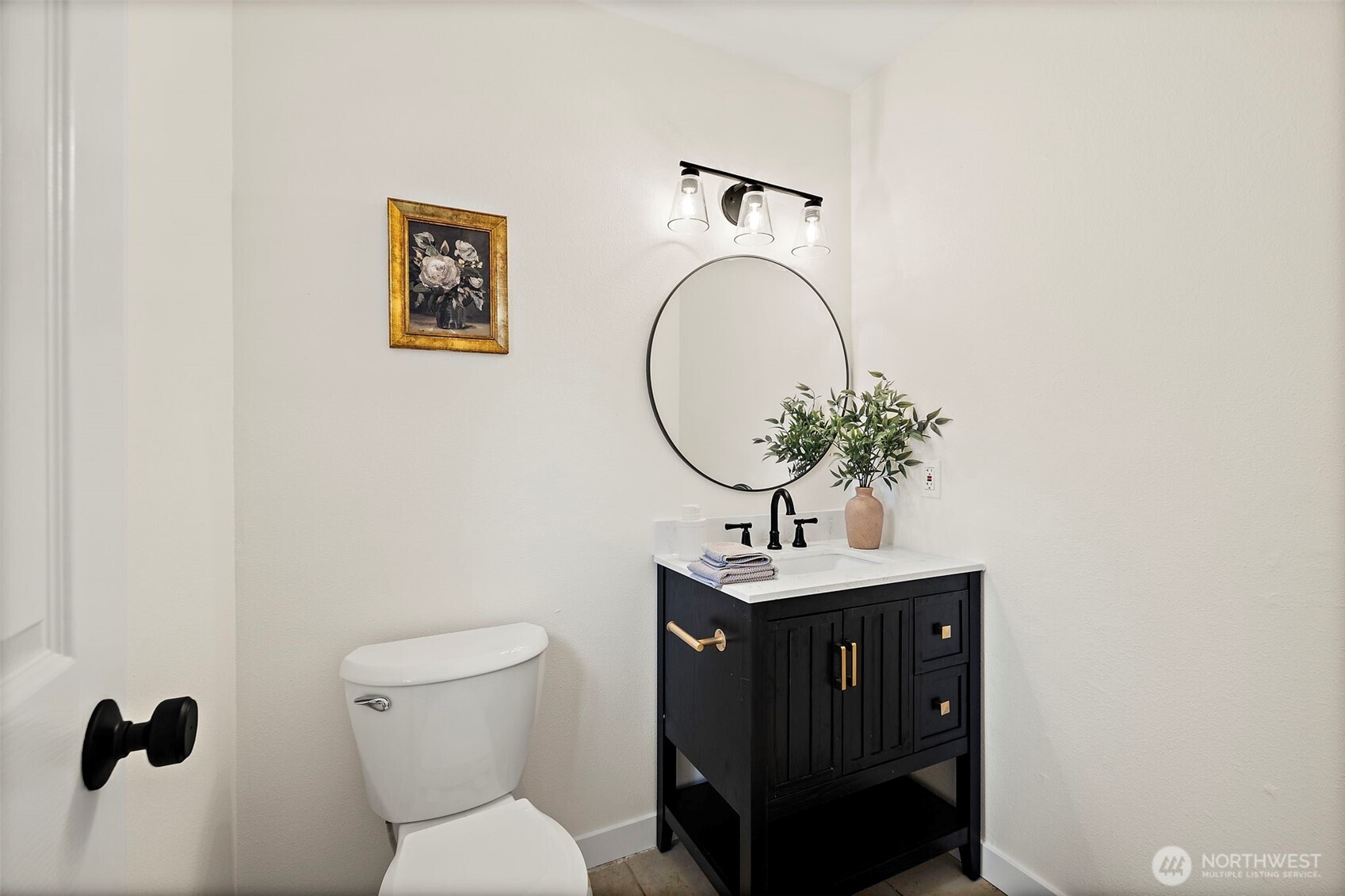 19250 Southeast 268th Street Covington, WA 98042 - Photo 24 of 37 a bathroom with a toilet a sink and mirror