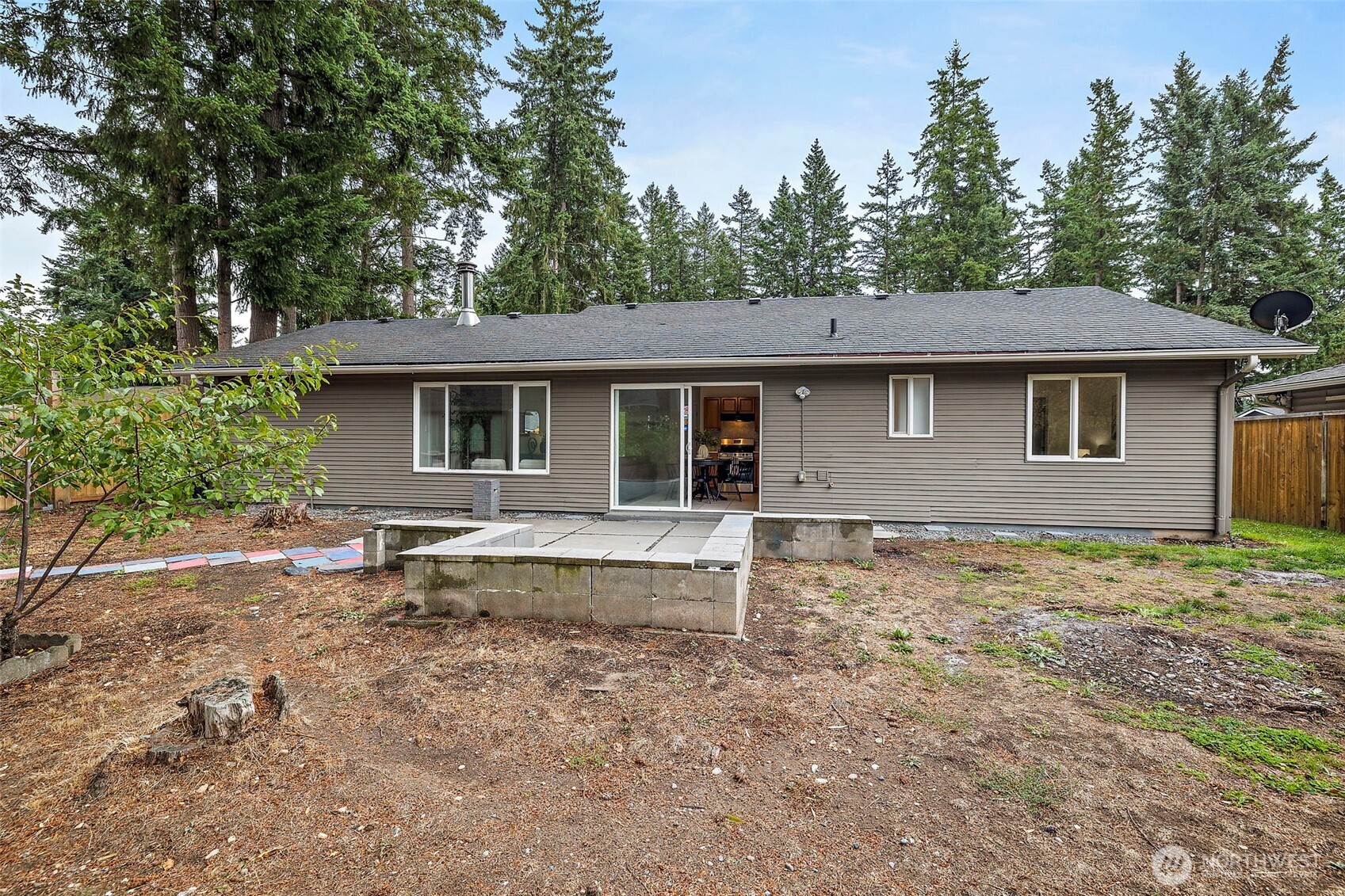 19250 Southeast 268th Street Covington, WA 98042 - Photo 27 of 37 a house view with a backyard space