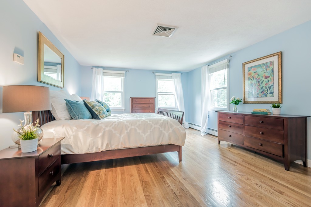 125 Rattlesnake Hill Road Andover, MA 01810 - Photo 17 of 28 a bed room with a bed and a window