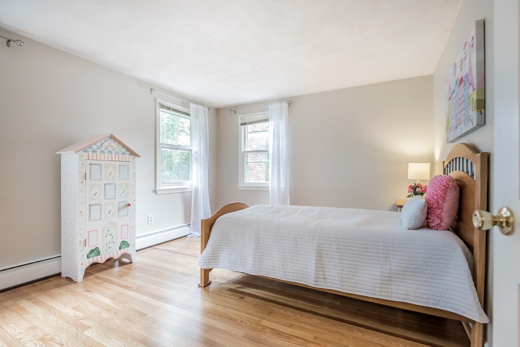 125 Rattlesnake Hill Road Andover, MA 01810 - Photo 20 of 28 a bed room with a bed and a window