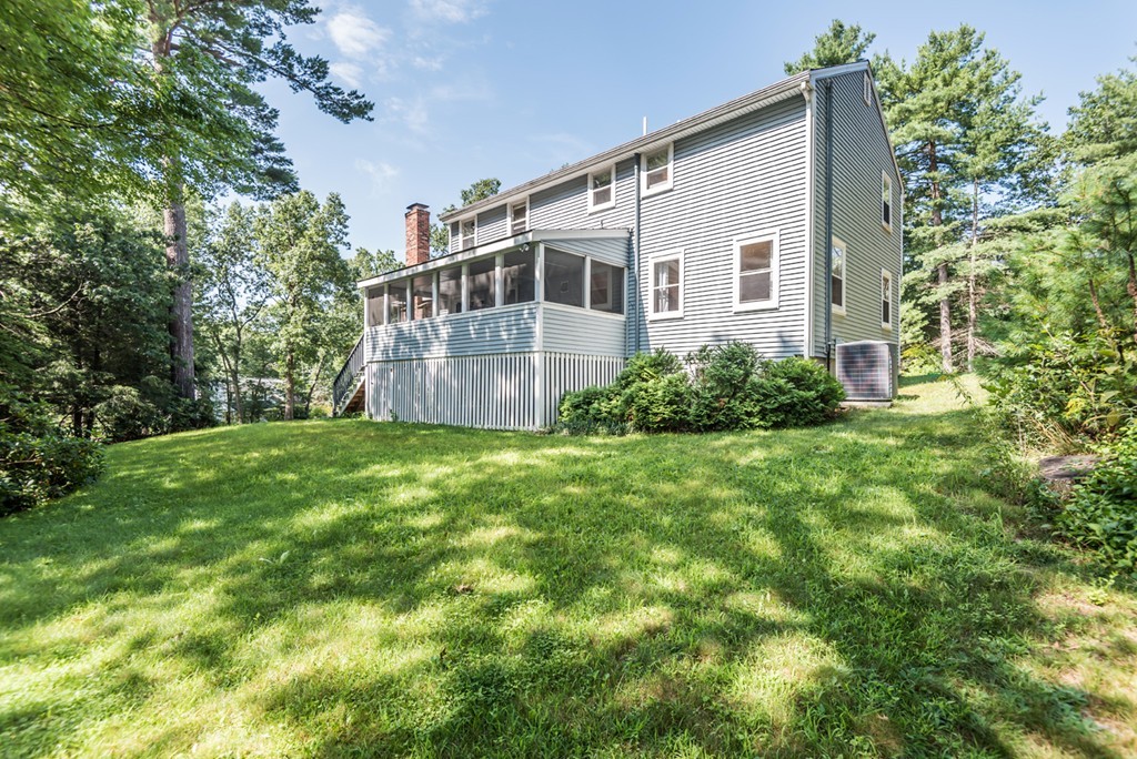 125 Rattlesnake Hill Road Andover, MA 01810 - Photo 26 of 28 a house view with a garden space