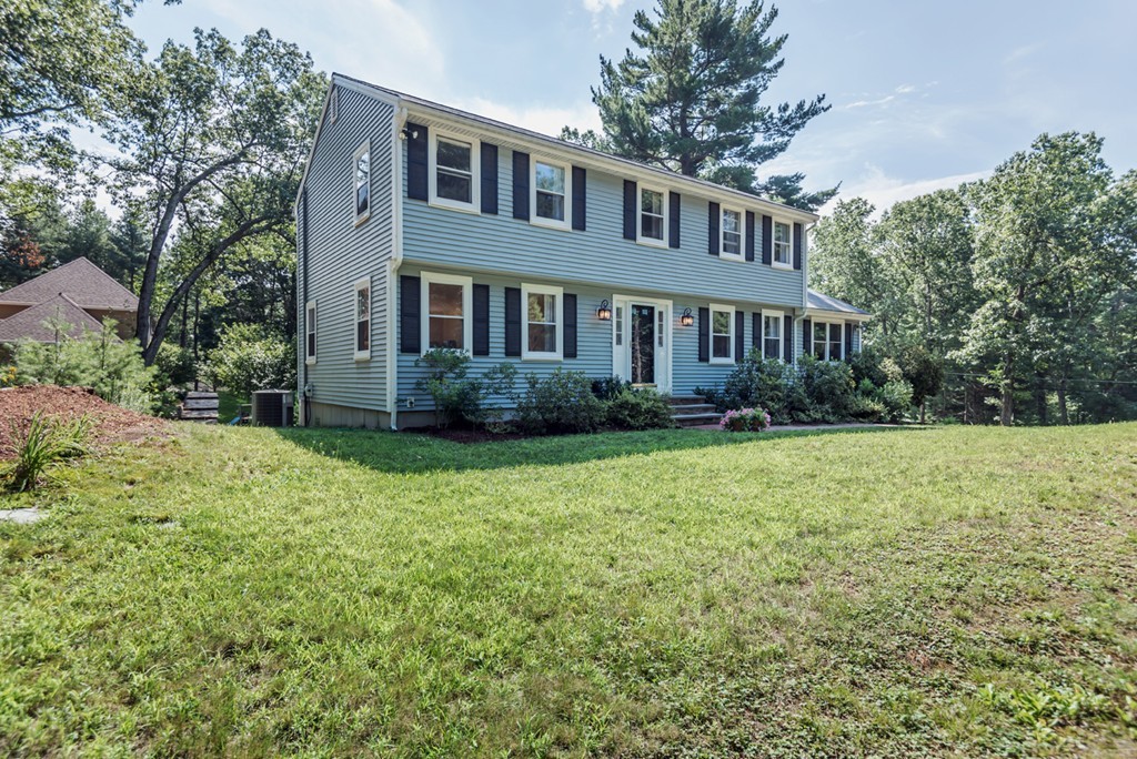 125 Rattlesnake Hill Road Andover, MA 01810 - Photo 28 of 28 a front view of a house with garden