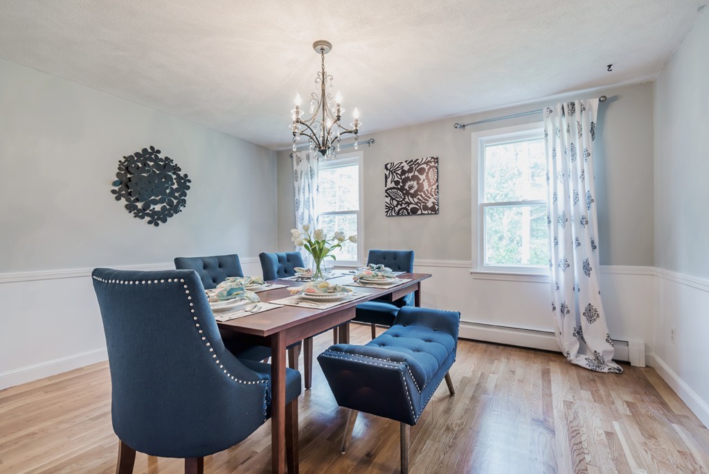 125 Rattlesnake Hill Road Andover, MA 01810 - Photo 5 of 28 a view of a dining room with furniture window and wooden floor