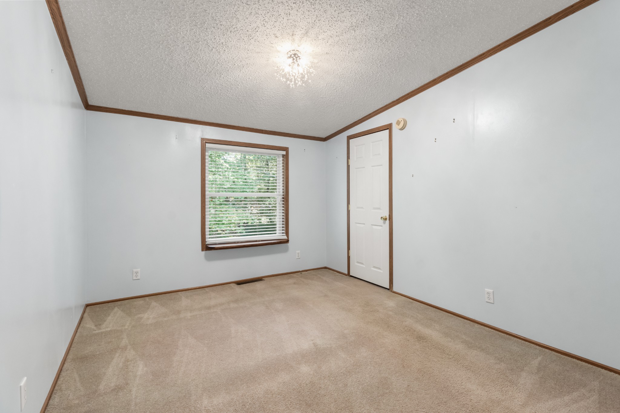4605 Marion Road Cunningham, TN 37052 - Photo 27 of 45 an empty room with windows