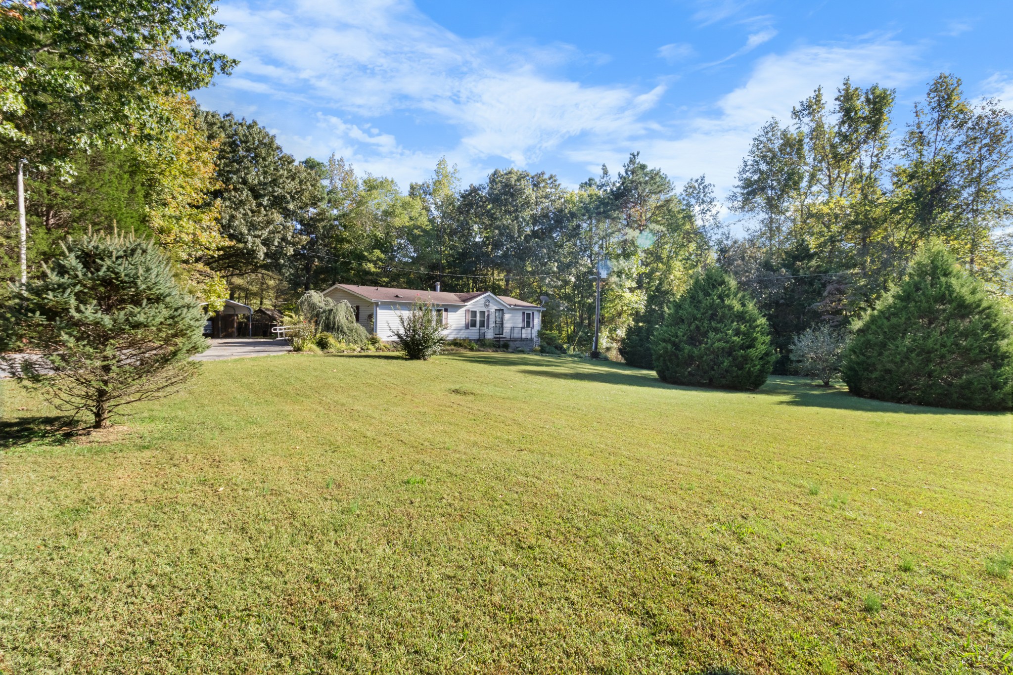 4605 Marion Road Cunningham, TN 37052 - Photo 3 of 45 a view of a swimming pool and an outdoor seating