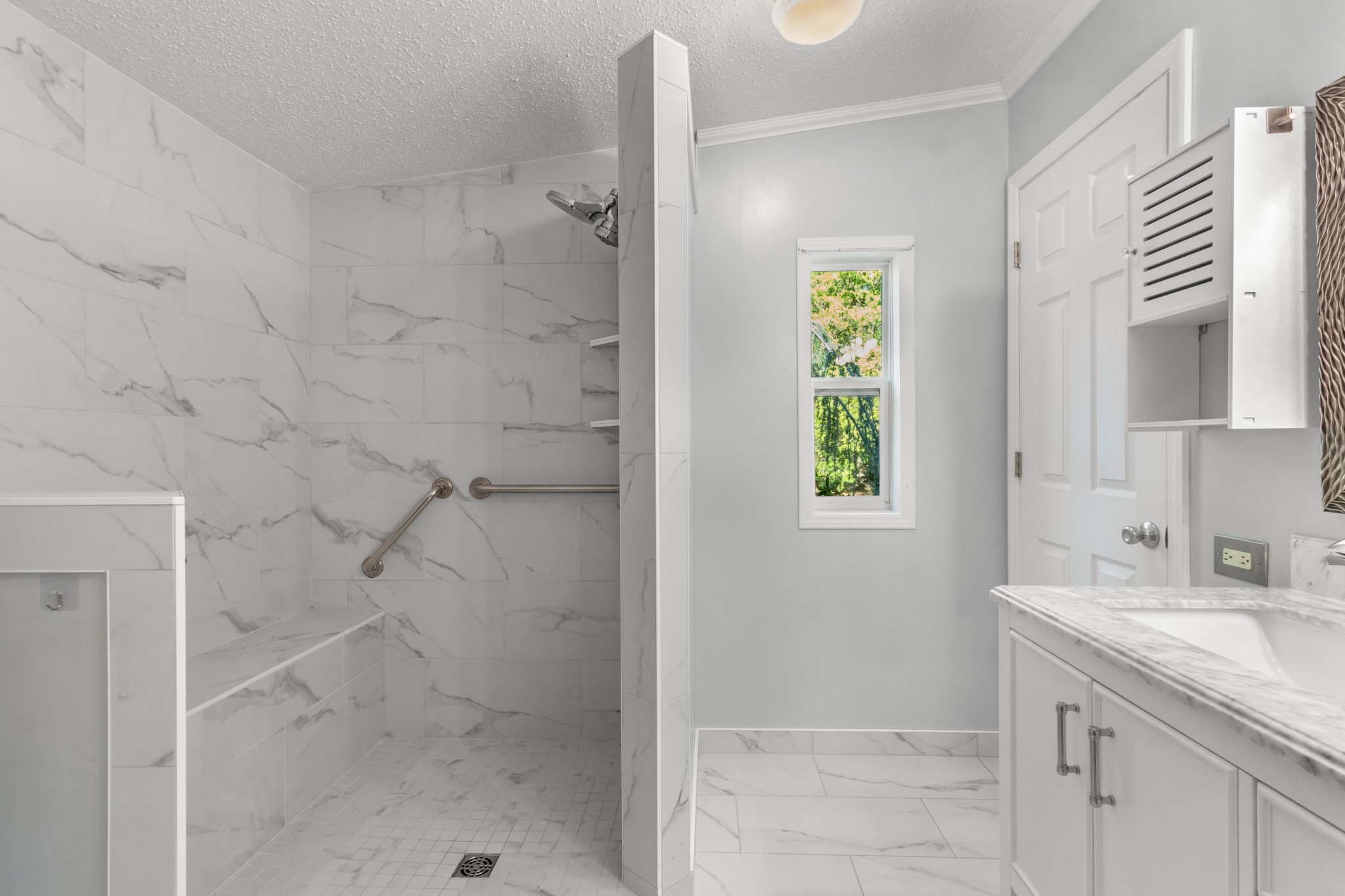 4605 Marion Road Cunningham, TN 37052 - Photo 36 of 45 a bathroom with a granite countertop shower a sink and a window