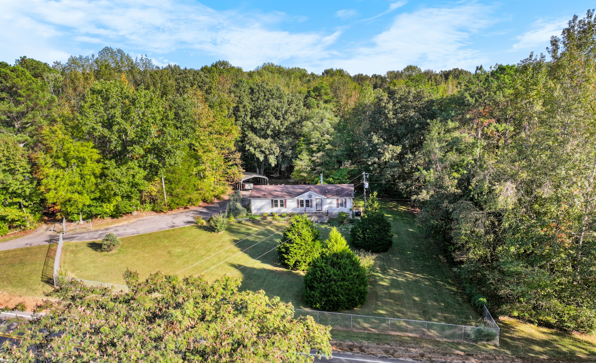 4605 Marion Road Cunningham, TN 37052 - Photo 44 of 45 a view of a lake with a mountain in the background