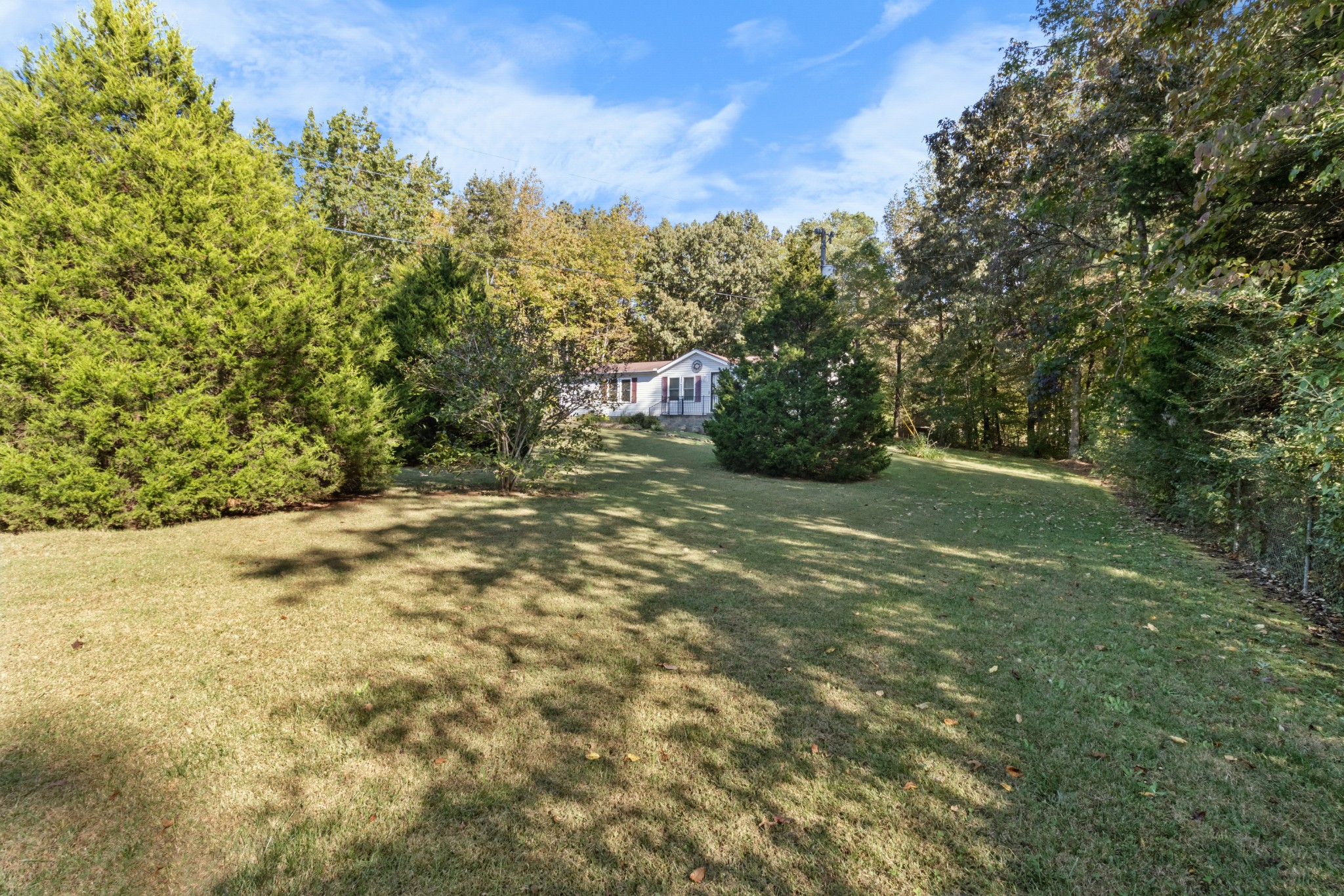 4605 Marion Road Cunningham, TN 37052 - Photo 5 of 45 a view of a yard with an outdoor space
