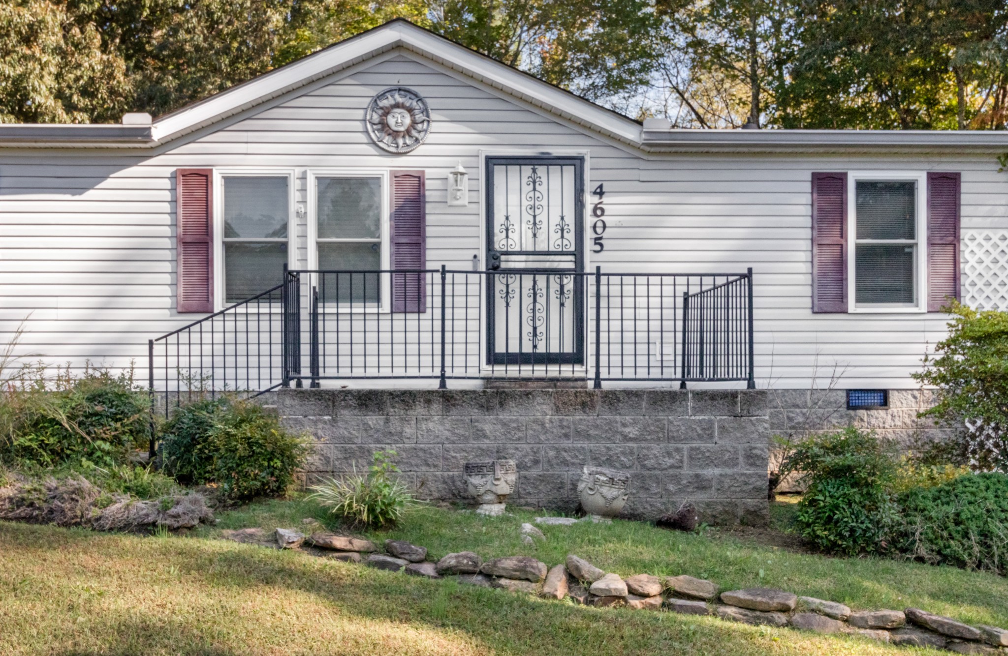 4605 Marion Road Cunningham, TN 37052 - Photo 6 of 45 a front view of a house with a garden