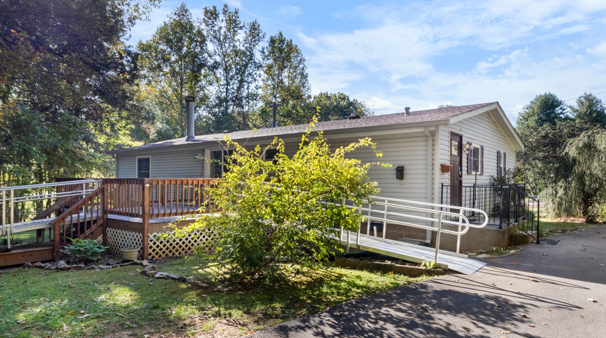 4605 Marion Road Cunningham, TN 37052 - Photo 8 of 45 a view of a house with a yard and sitting area