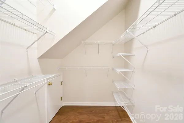 a view of small space with racks on the wall