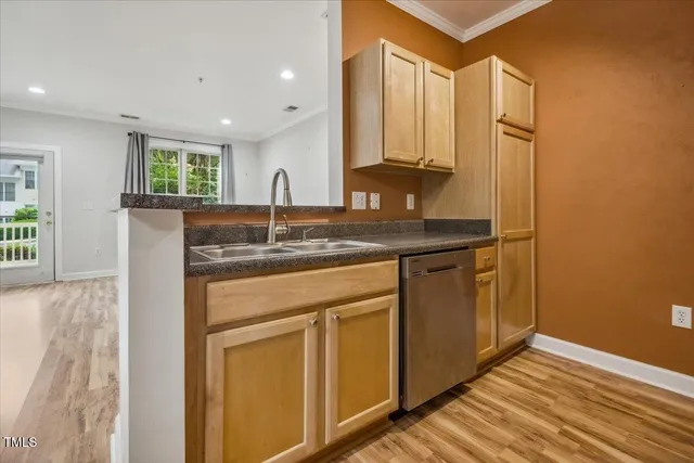 a kitchen with a refrigerator stove and microwave