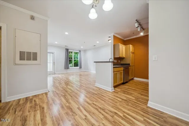 a view of a livingroom with wooden floor