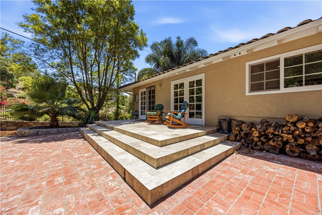 1485 Vía Ladera Fallbrook, CA 92028 - Photo 39 of 43 a view of house with backyard and sitting area