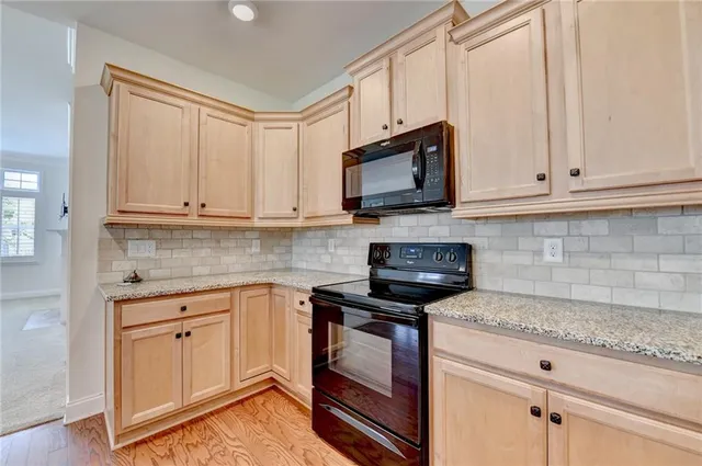 a view of an empty room and closet area