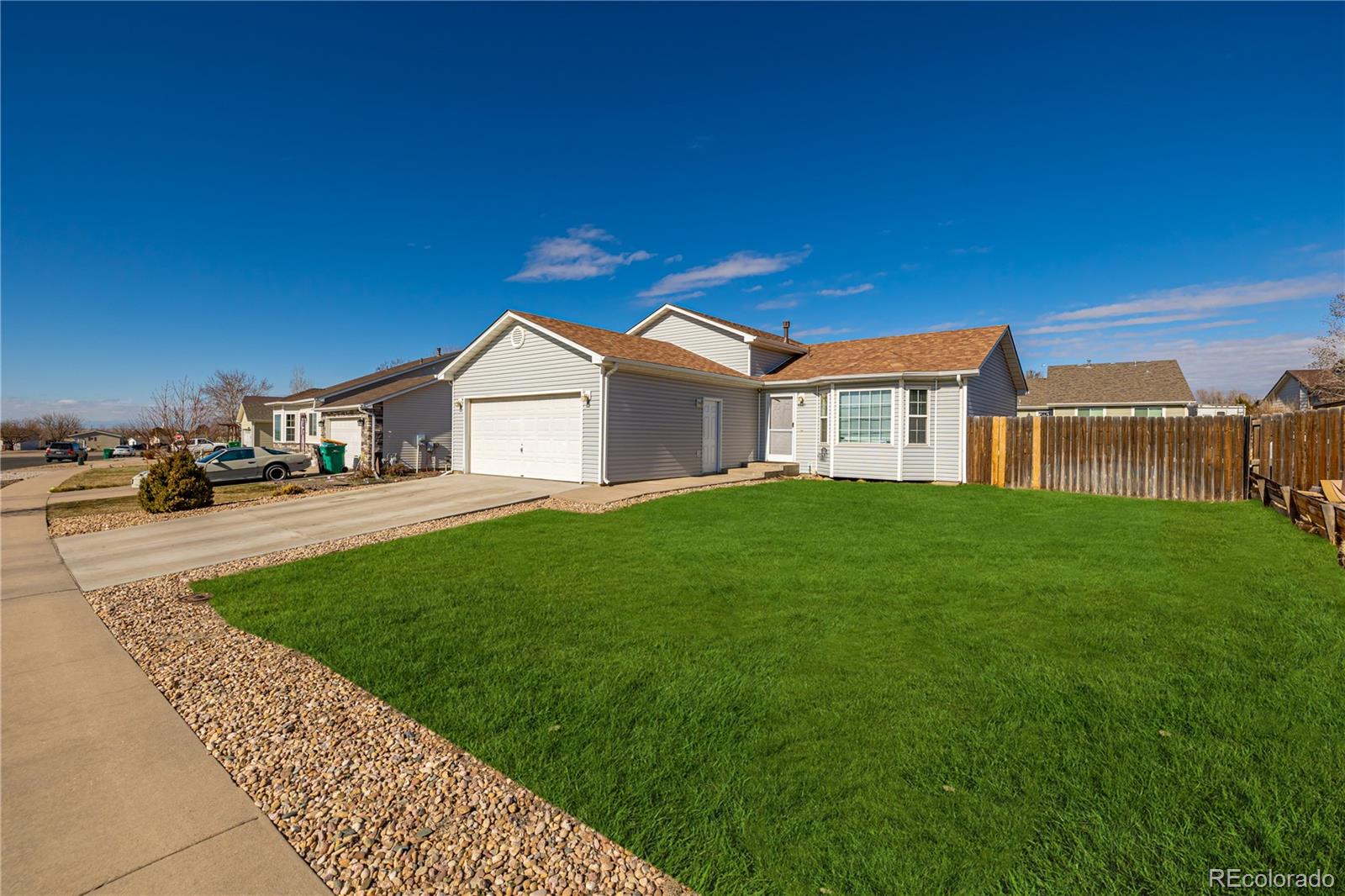 a view of a yard in front of house