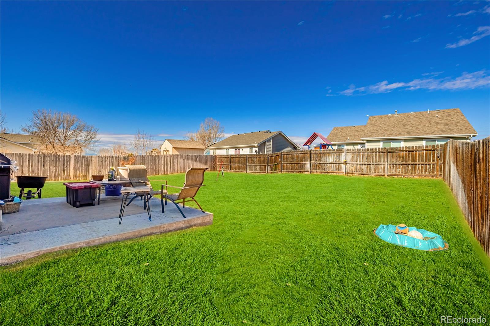 4005 Eagles Nest Drive Evans, CO 80620 - Photo 19 of 26 a view of a house with a yard porch and sitting area