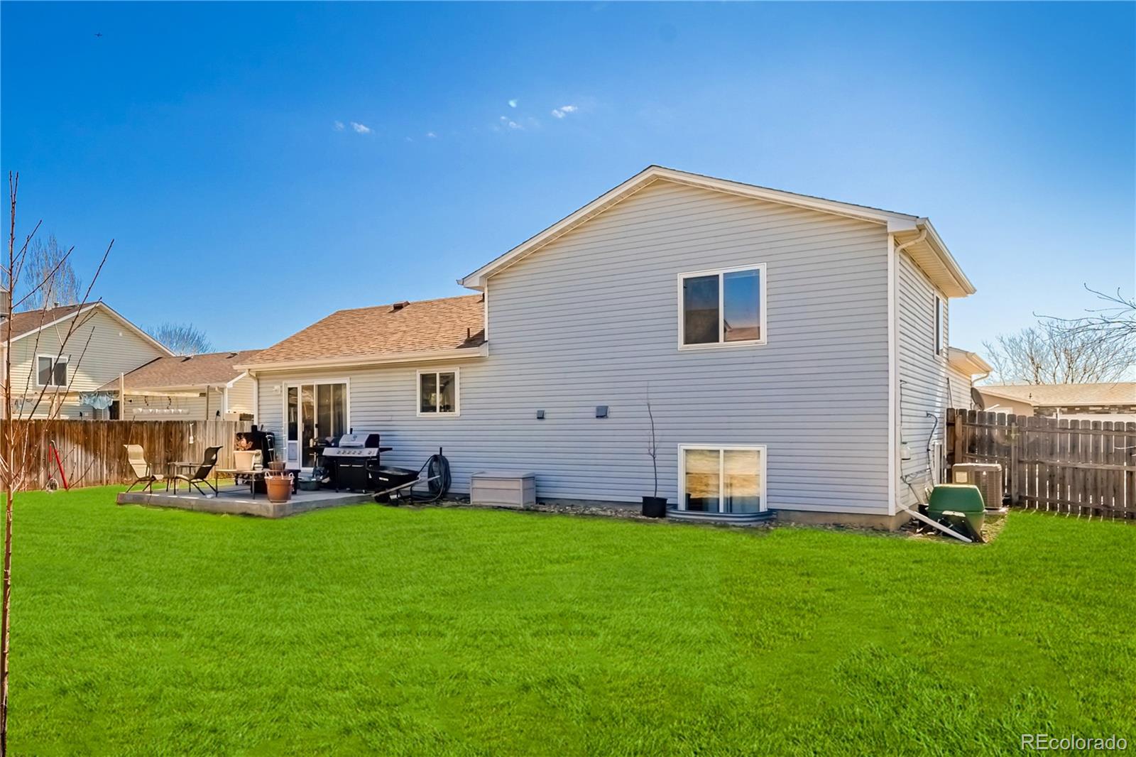 4005 Eagles Nest Drive Evans, CO 80620 - Photo 20 of 26 a view of a house with a yard and sitting area