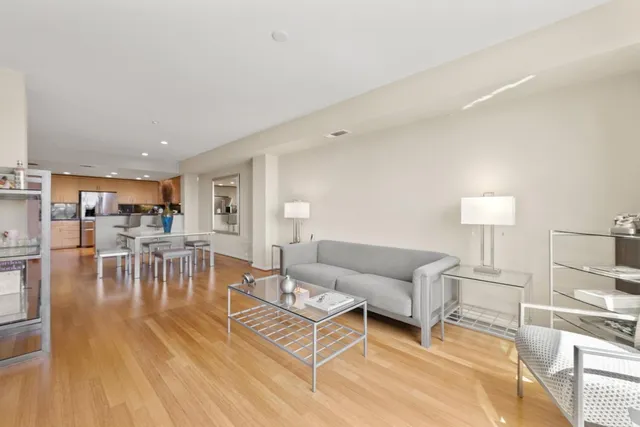 a living room with furniture and a table