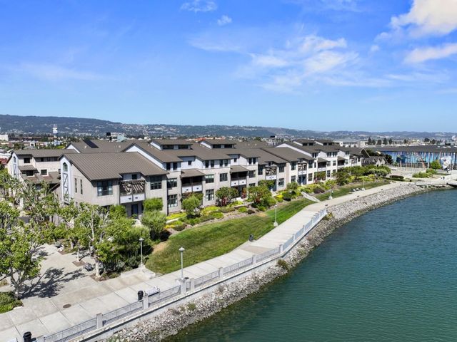 an aerial view of a house with a garden