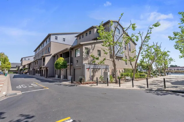an aerial view of a house with a ocean view