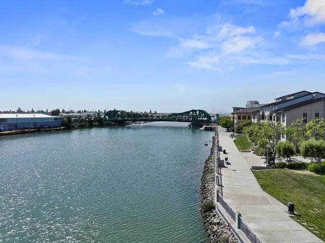 a aerial view of a house with a lake view