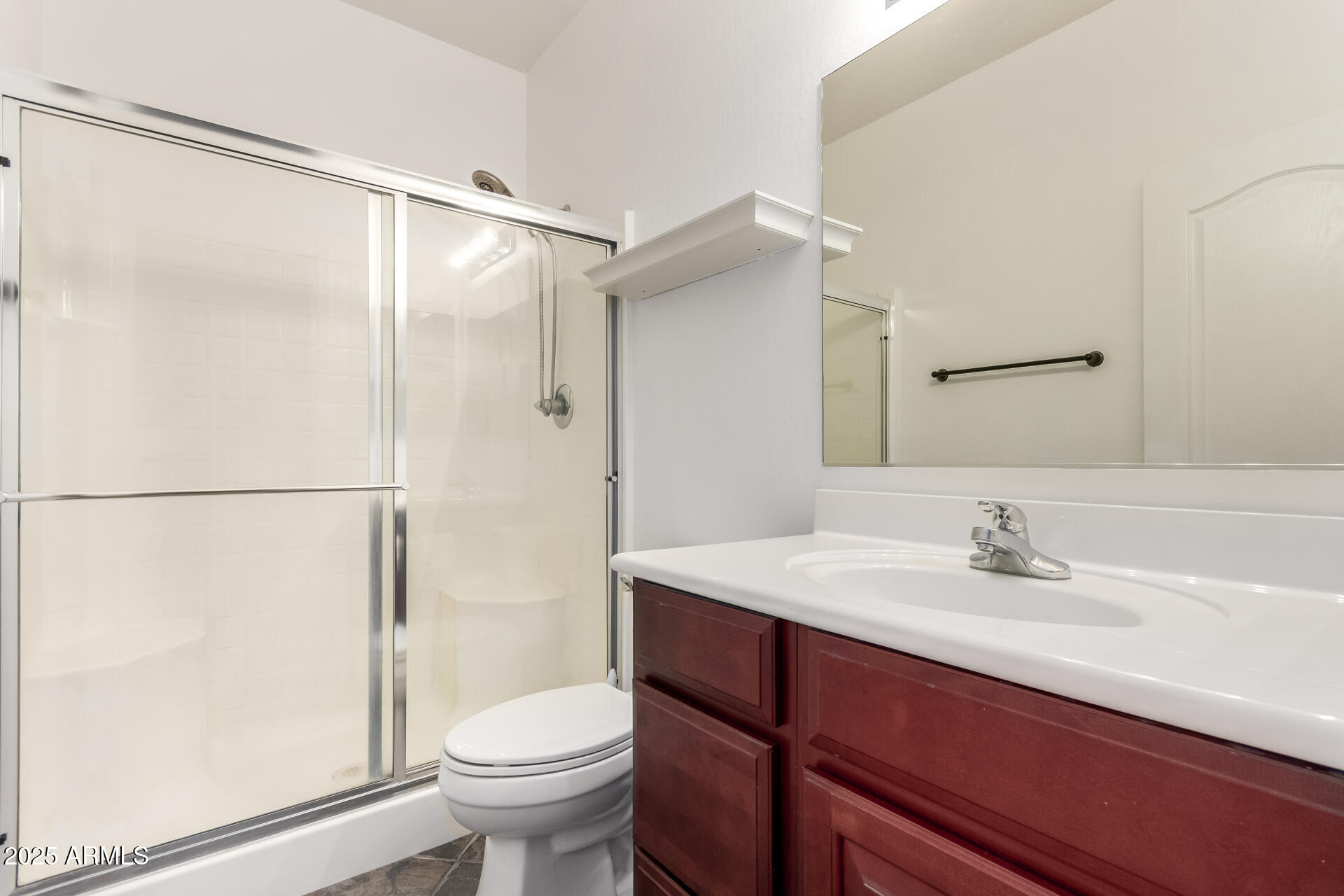 1126 East Pedro Road Phoenix, AZ 85042 - Photo 14 of 34 a bathroom with a sink toilet and shower