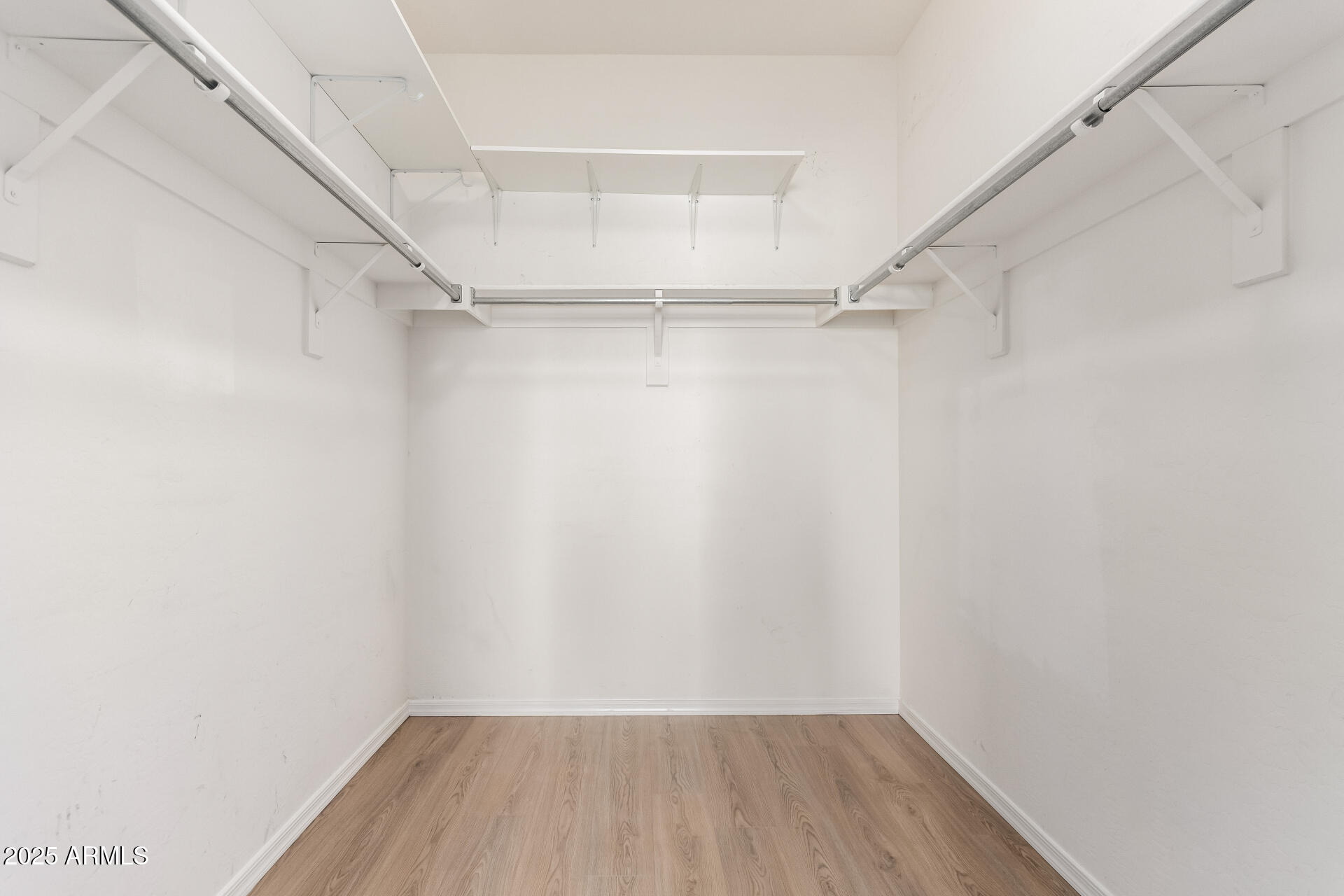 1126 East Pedro Road Phoenix, AZ 85042 - Photo 15 of 34 a view of an empty walk in closet