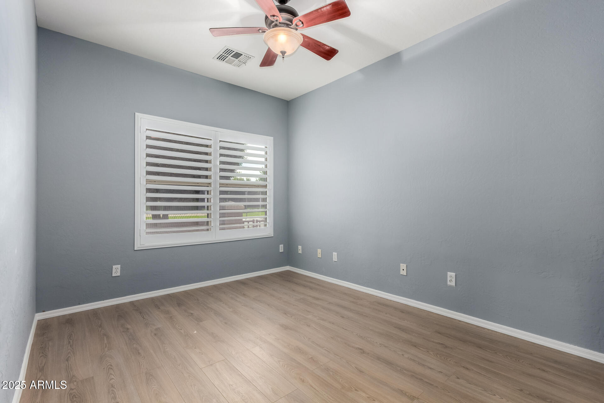 1126 East Pedro Road Phoenix, AZ 85042 - Photo 16 of 34 a view of an empty room with a window