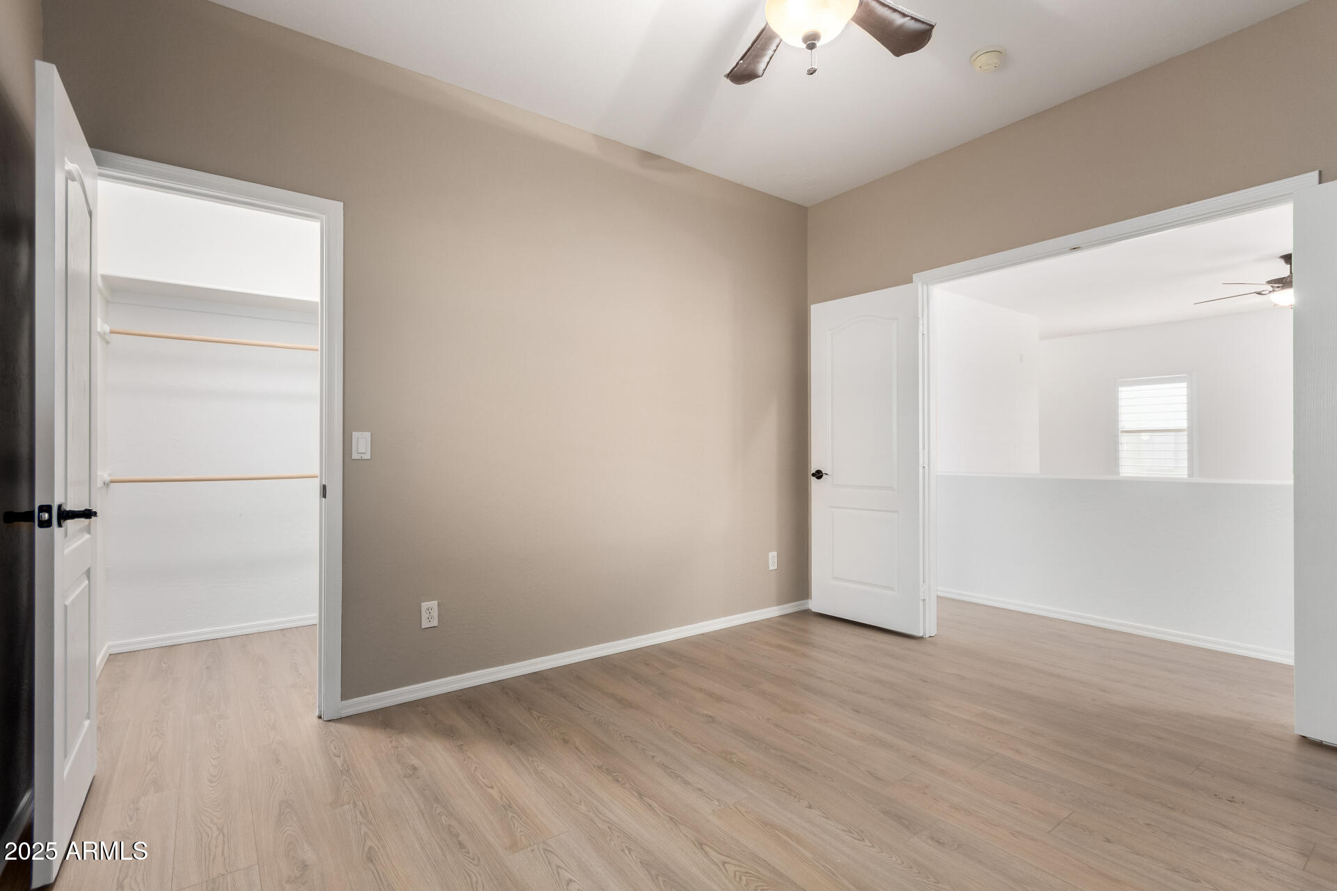 1126 East Pedro Road Phoenix, AZ 85042 - Photo 19 of 34 wooden floor in an empty room