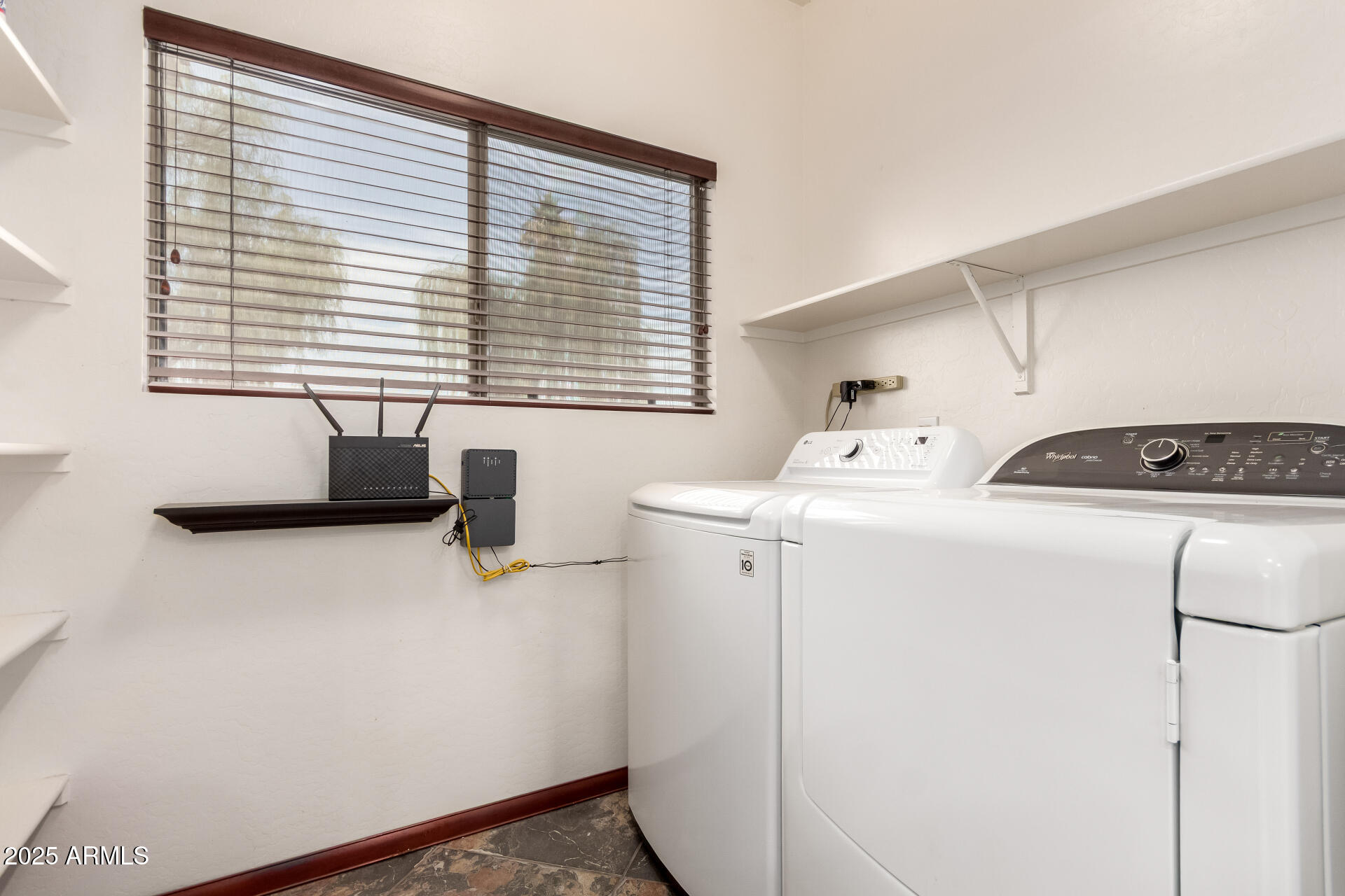 1126 East Pedro Road Phoenix, AZ 85042 - Photo 23 of 34 a utility room with dryer and washer