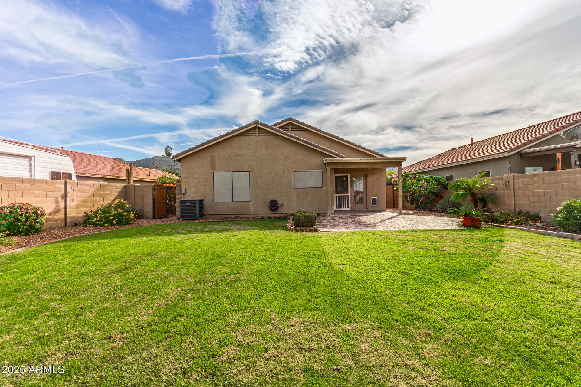 1126 East Pedro Road Phoenix, AZ 85042 - Photo 25 of 34 a house view with a garden space