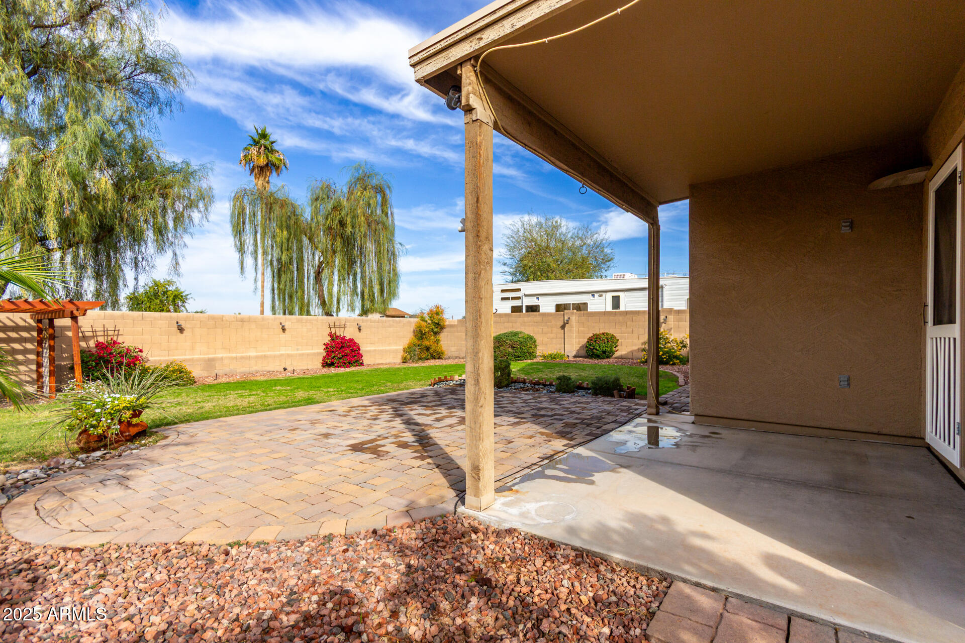 1126 East Pedro Road Phoenix, AZ 85042 - Photo 28 of 34 a view of a backyard with a garden