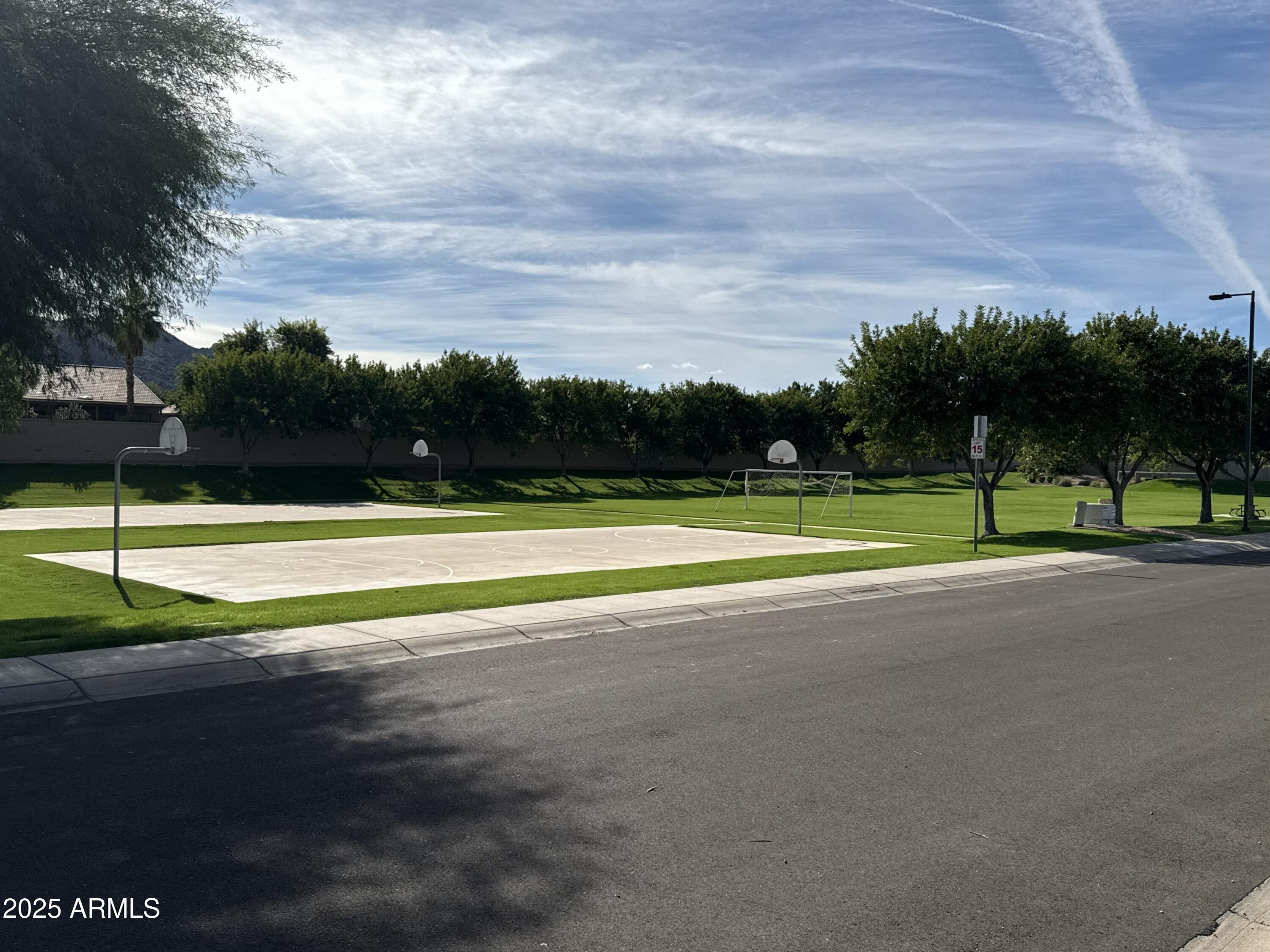 1126 East Pedro Road Phoenix, AZ 85042 - Photo 34 of 34 a view of a tennis court