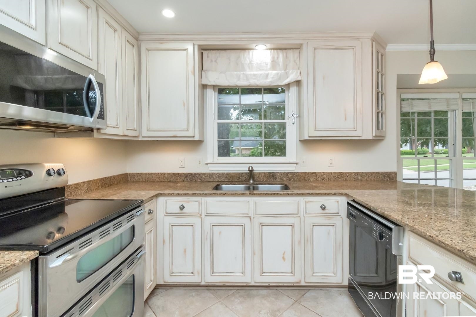 1229 West Chimney Top Drive Mobile, AL 36695 - Photo 13 of 36 Kitchen featuring stainless steel appliances, plenty of natural light, sink, and crown molding