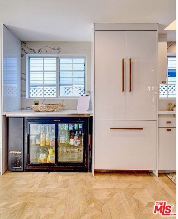 138 Roma Court Marina del Rey, CA 90292 - Photo 14 of 38 a view of a room with a window and a refrigerator