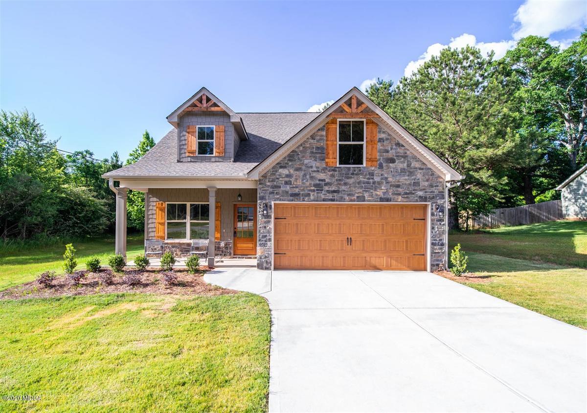 339 Walnut Grove Road Gray, GA 31032 - Photo 1 of 30 a front view of house with yard and trees in the background