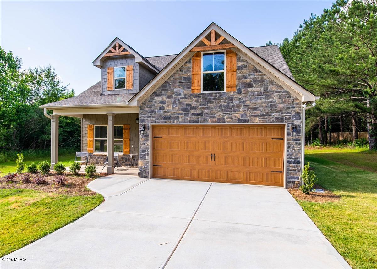 339 Walnut Grove Road Gray, GA 31032 - Photo 2 of 30 a front view of a house with a yard