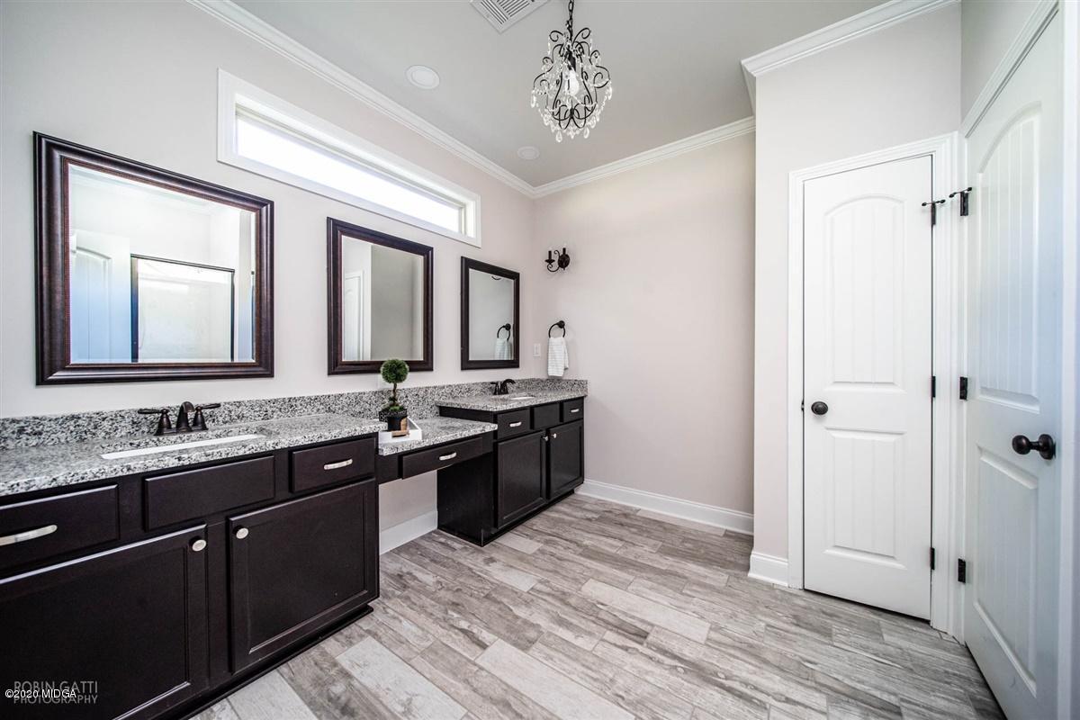 339 Walnut Grove Road Gray, GA 31032 - Photo 17 of 30 a large kitchen with a sink and refrigerator