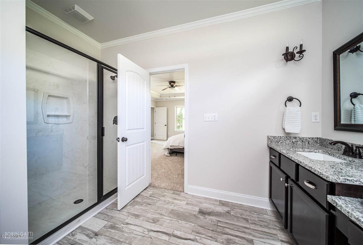 339 Walnut Grove Road Gray, GA 31032 - Photo 19 of 30 a view of a bathroom from the hallway