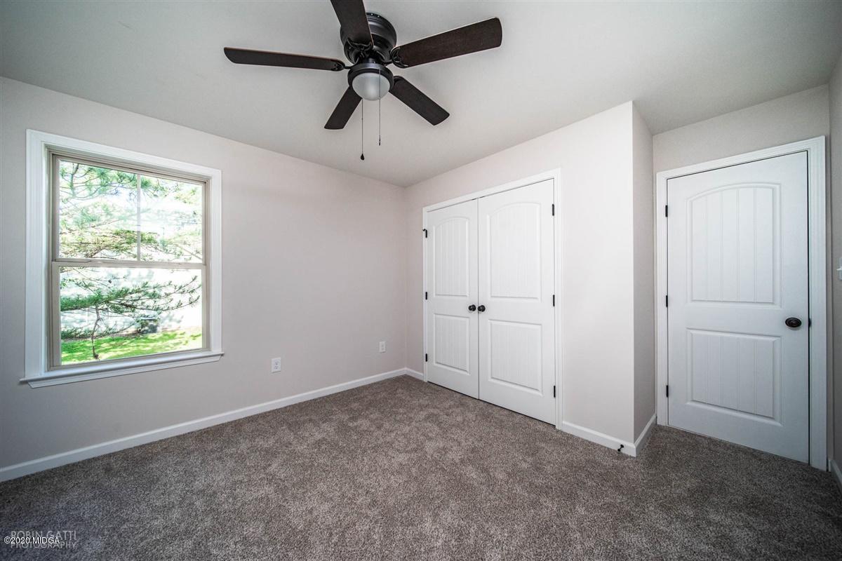 339 Walnut Grove Road Gray, GA 31032 - Photo 21 of 30 a view of an empty room with a window