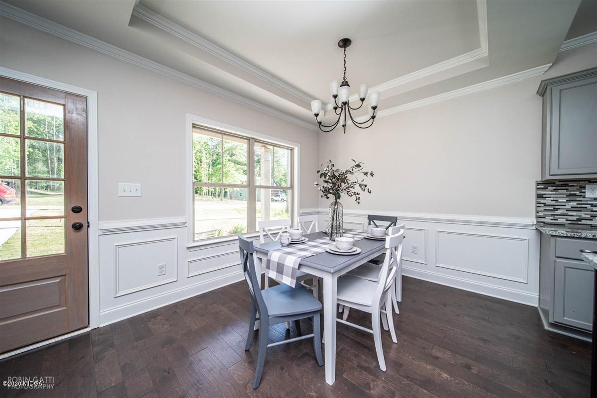 339 Walnut Grove Road Gray, GA 31032 - Photo 4 of 30 a view of a dining room with furniture window and wooden floor