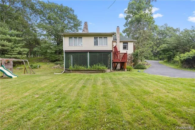 front view of a house with a big yard