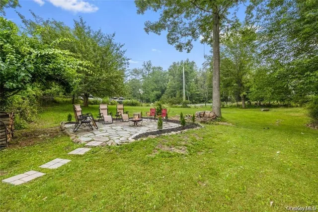 a view of a park with swings and slides