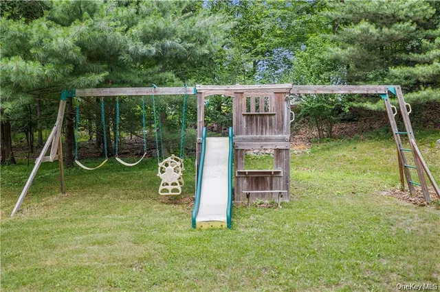 a view of a park with large trees