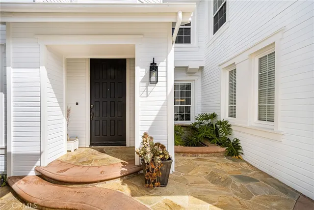 a view of an empty room with a fireplace