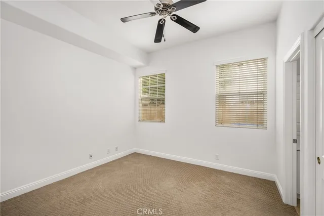 a kitchen with stainless steel appliances granite countertop a stove and a refrigerator