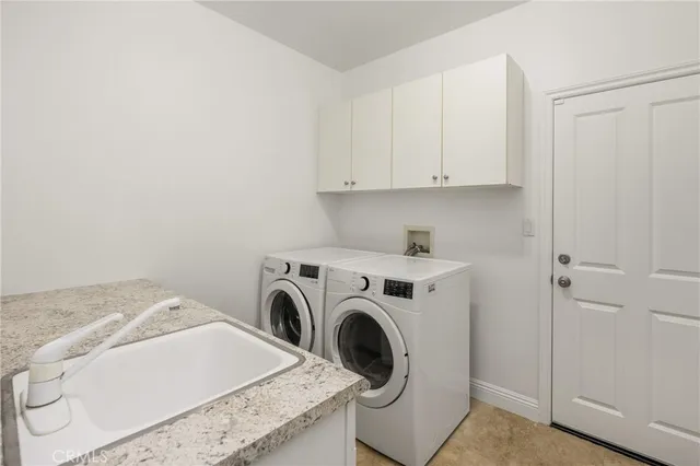 a swimming pool with outdoor seating and yard