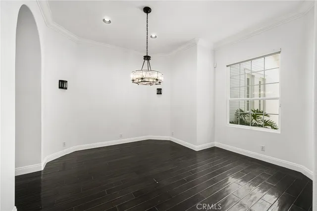 a living room with furniture and windows